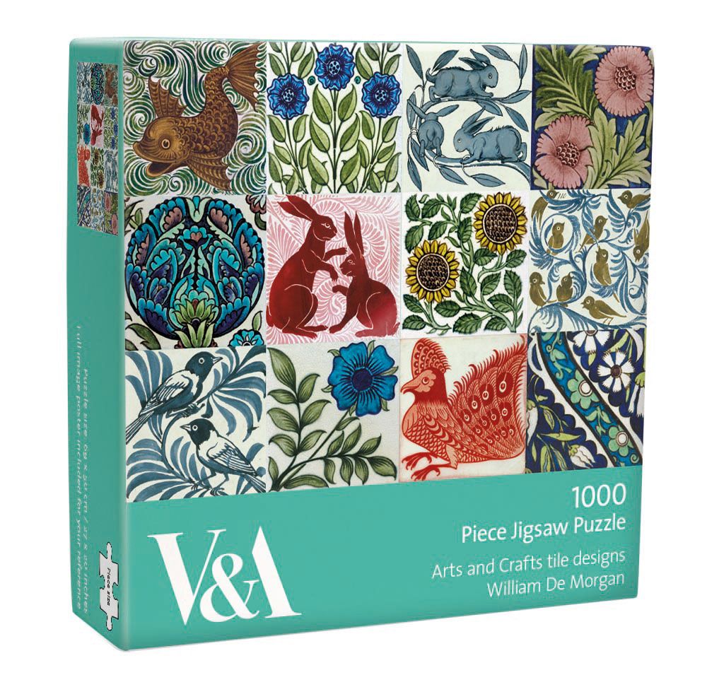 V&A 1000-piece jigsaw puzzle box featuring William De Morgan's Arts and Crafts tile designs, with a teal base and a multicolor collage of floral, animal, and geometric patterns.