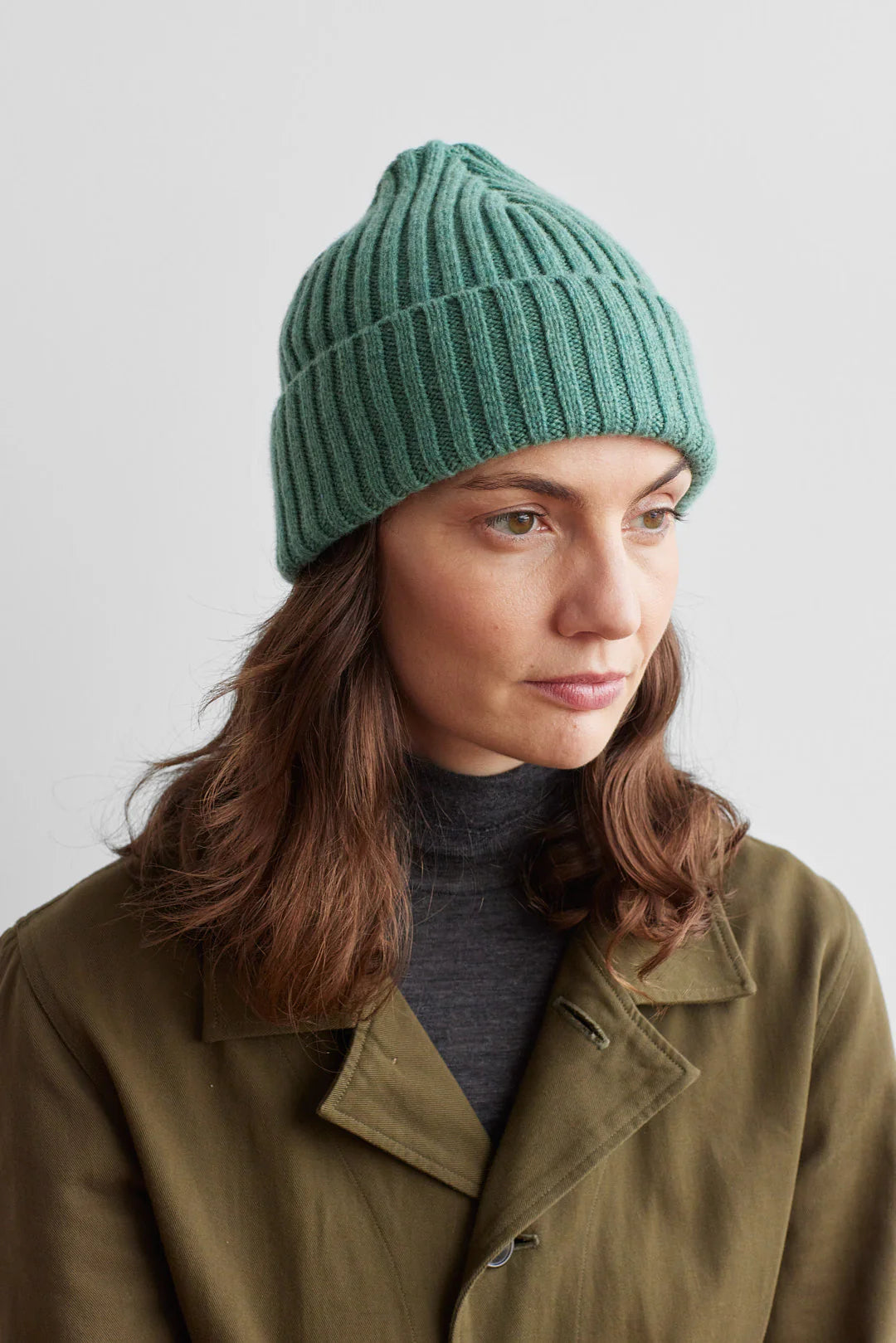 Seafoam green ribbed knit beanie.