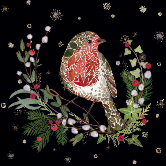 A robin, crafted from pressed leaves and flowers, perches on a branch adorned with winter berries and pussy willows against