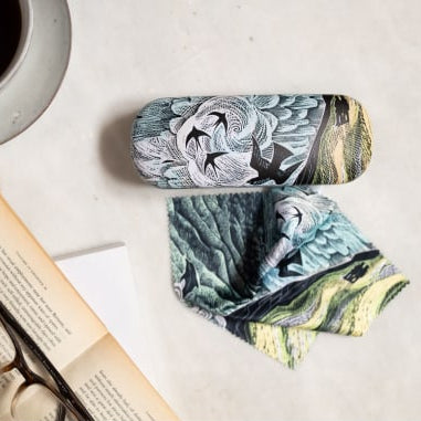 Glasses Case with a nature design on a table with a cup of coffee, book, and glasses.