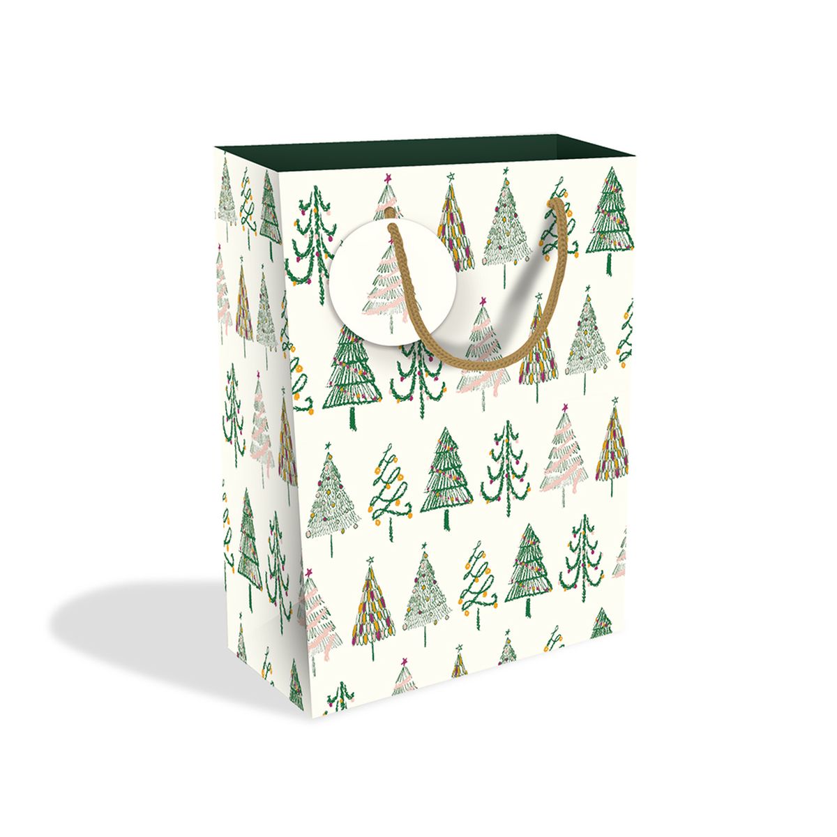 A tall gift bag with a white background printed with a pattern of Christmas trees in green, pink, and gold, featuring dark green handles.