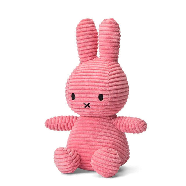 Pink corduroy Miffy plush toy sitting down.  Simple embroidered facial features.