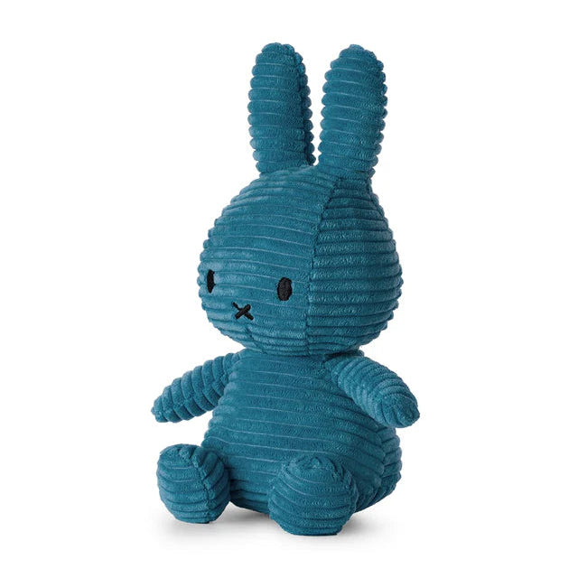 Teal corduroy Miffy plush toy in a seated position.