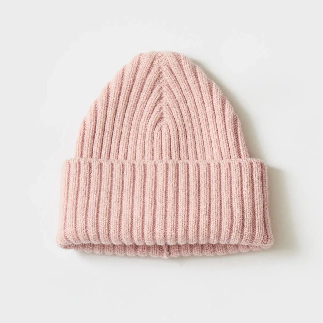 Pink ribbed knit beanie hat.