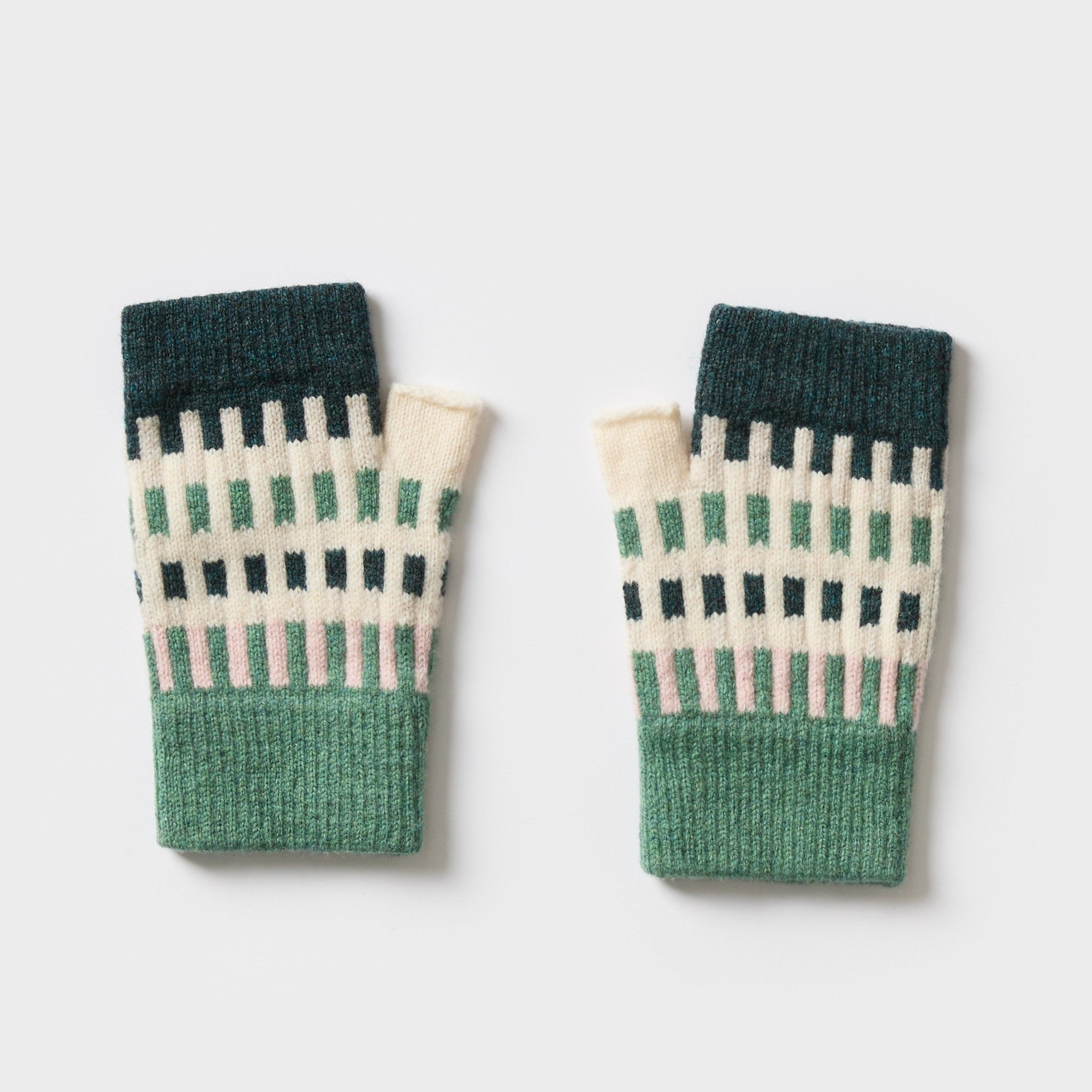 Pair of fingerless gloves in teal, green, and cream knit with geometric pattern.