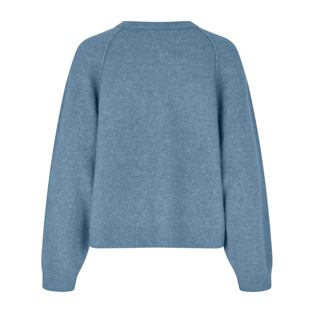 Blue sweater on a white background