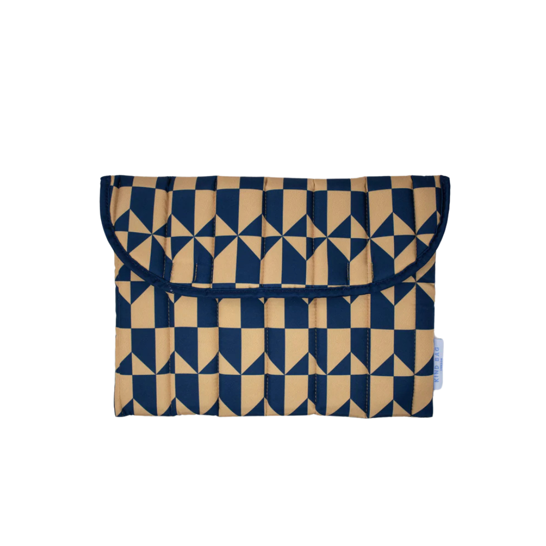 Quilted navy and gold geometric patterned laptop sleeve.