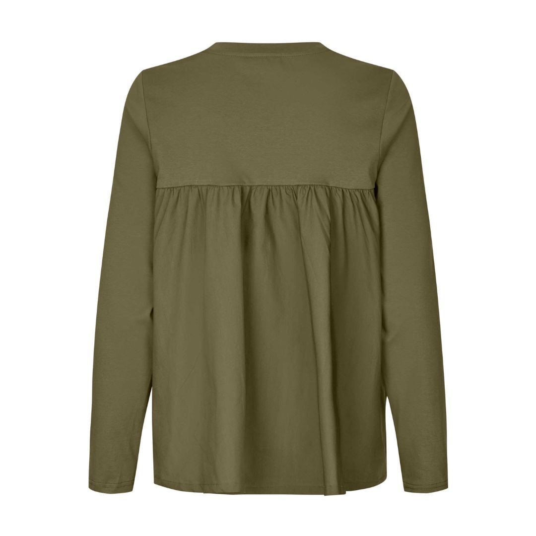 Green long-sleeve top on a white background