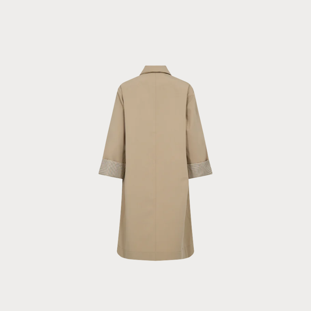 Beige trench coat on a light gray background