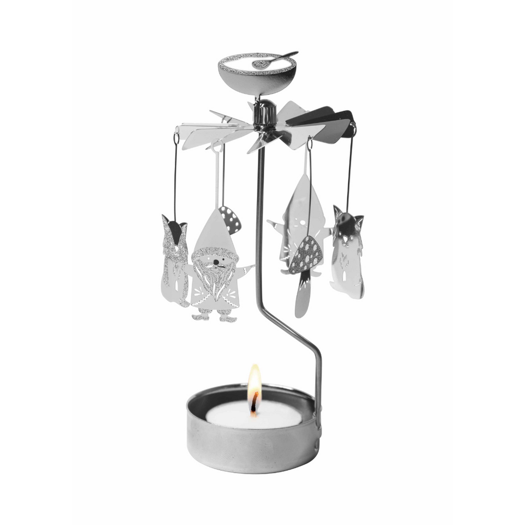 Decorative candle holder with spinning animal figures on a white background