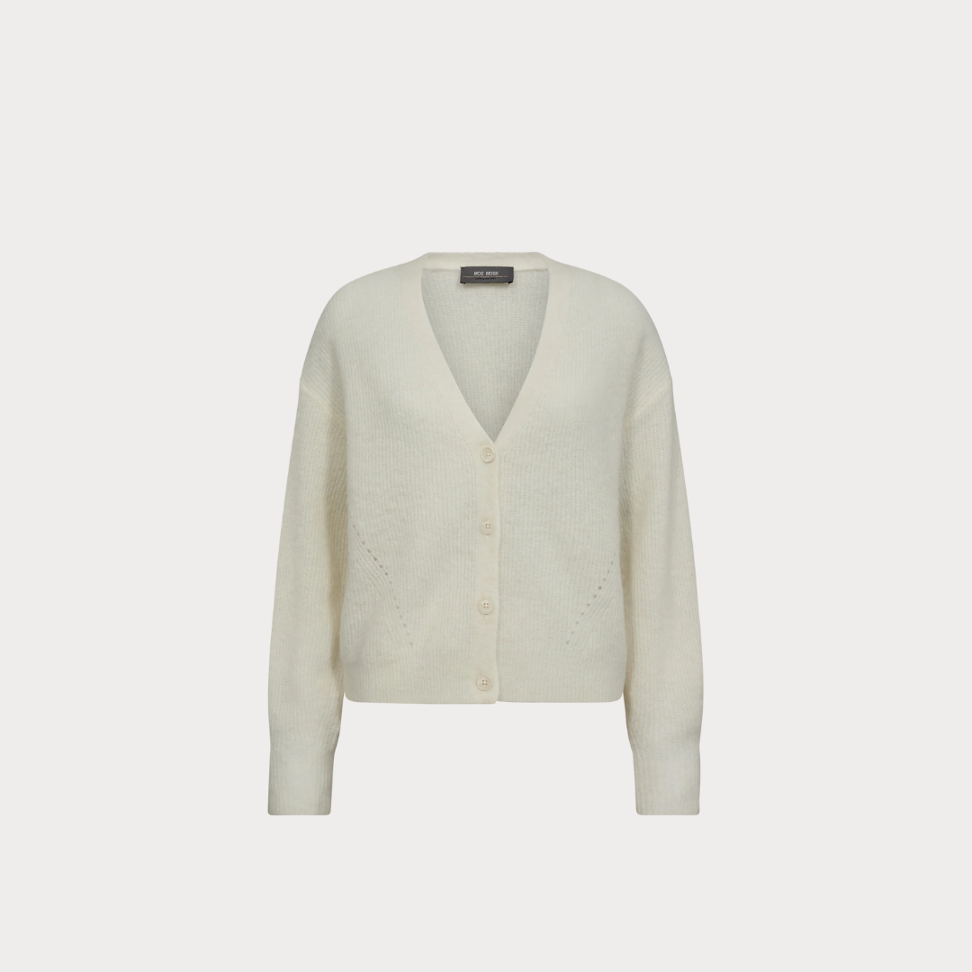 White cardigan on a light gray background