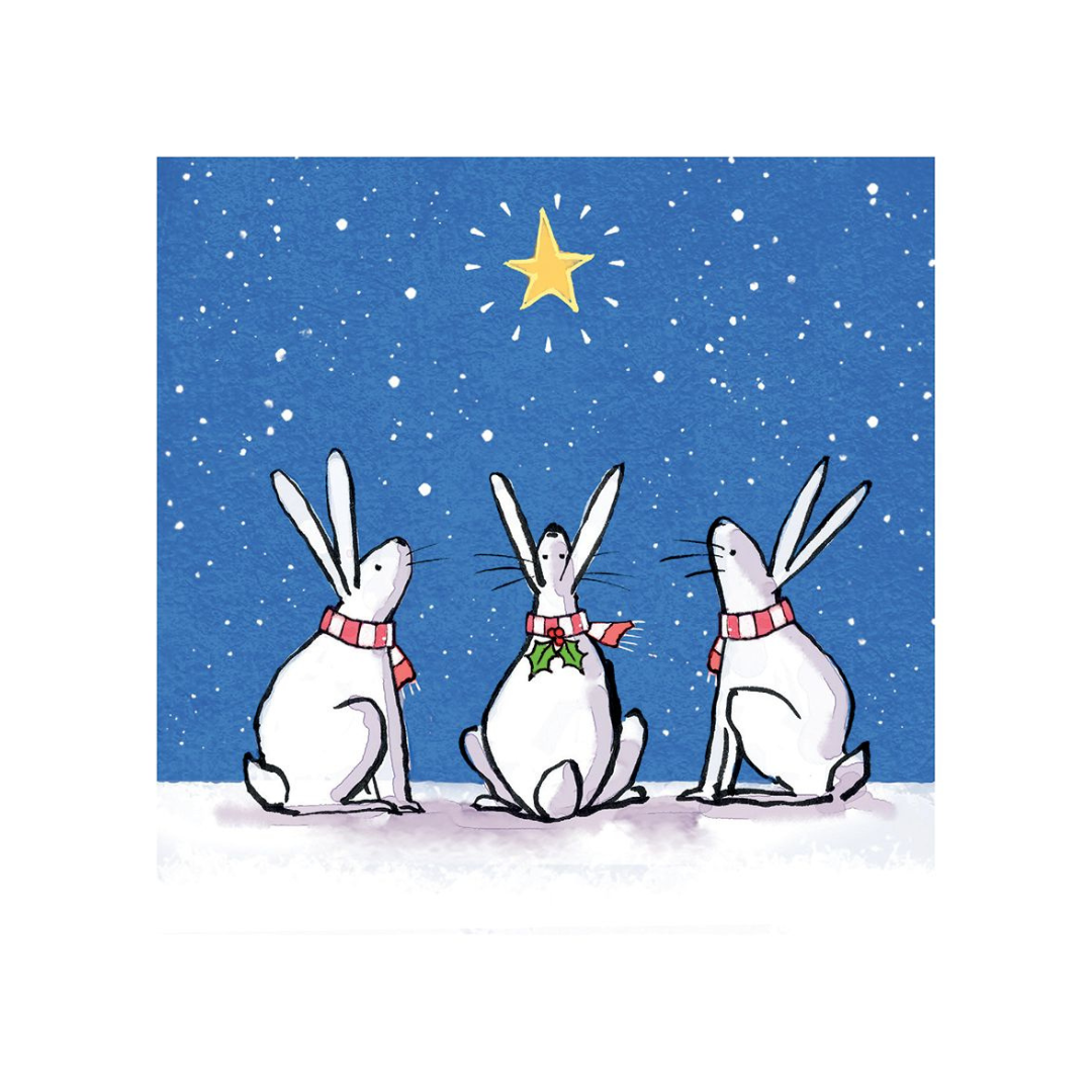 Three cartoon rabbits with red scarves looking up at a yellow star in a blue sky with white dots.