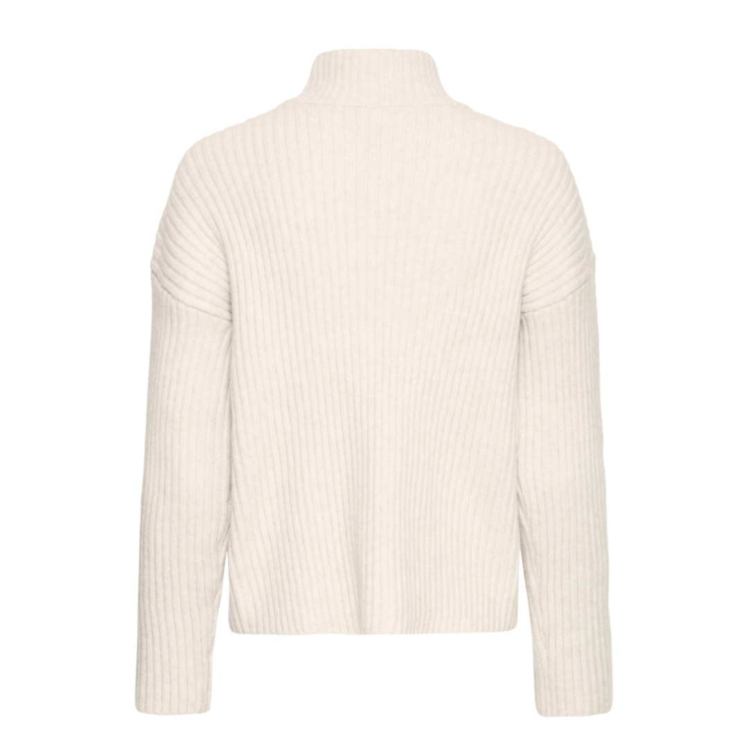 Beige ribbed sweater on a white background