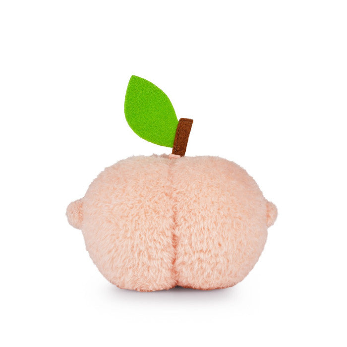 Plush peach toy with a green leaf on a white background