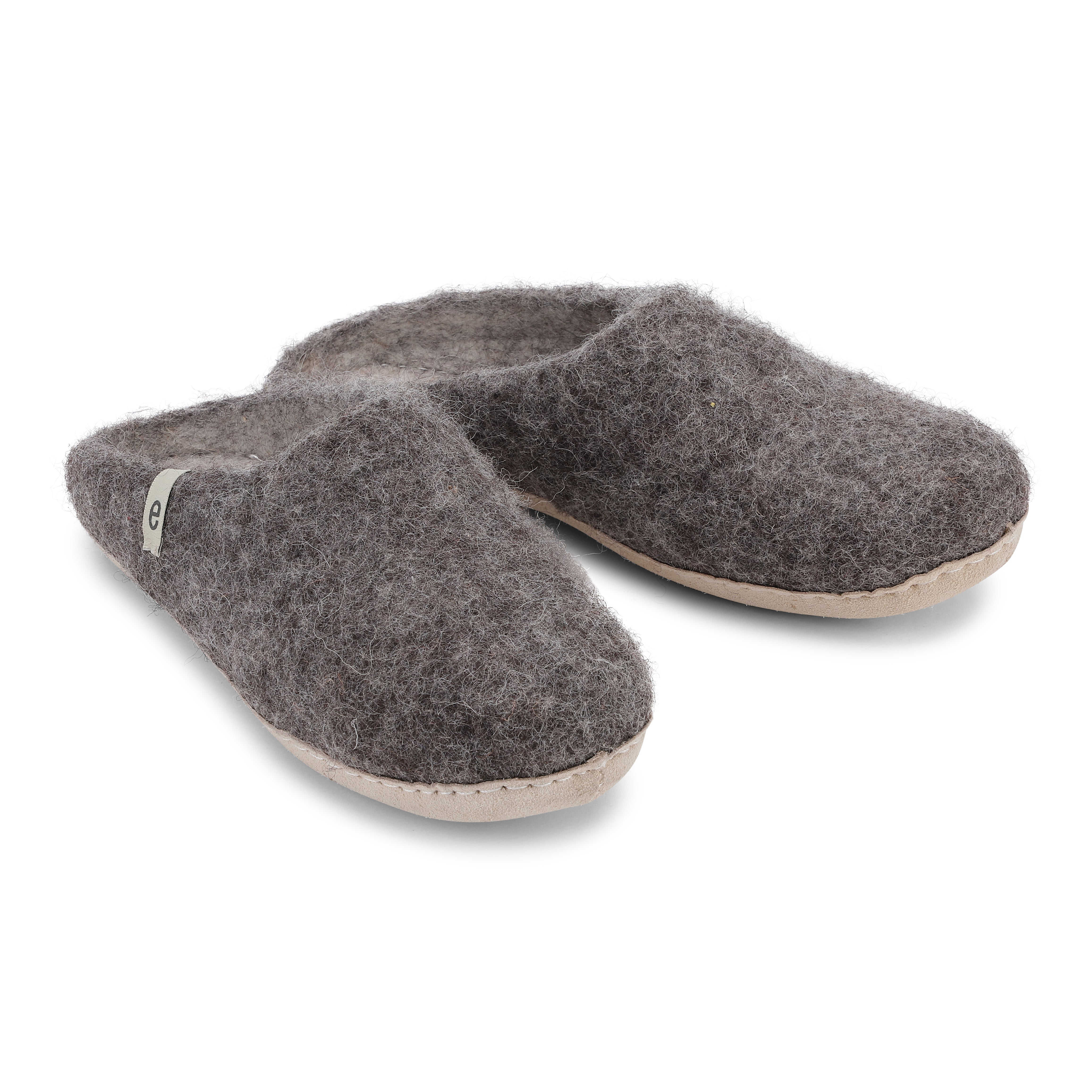 Pair of dark gray wool felt slippers with light beige soles.
