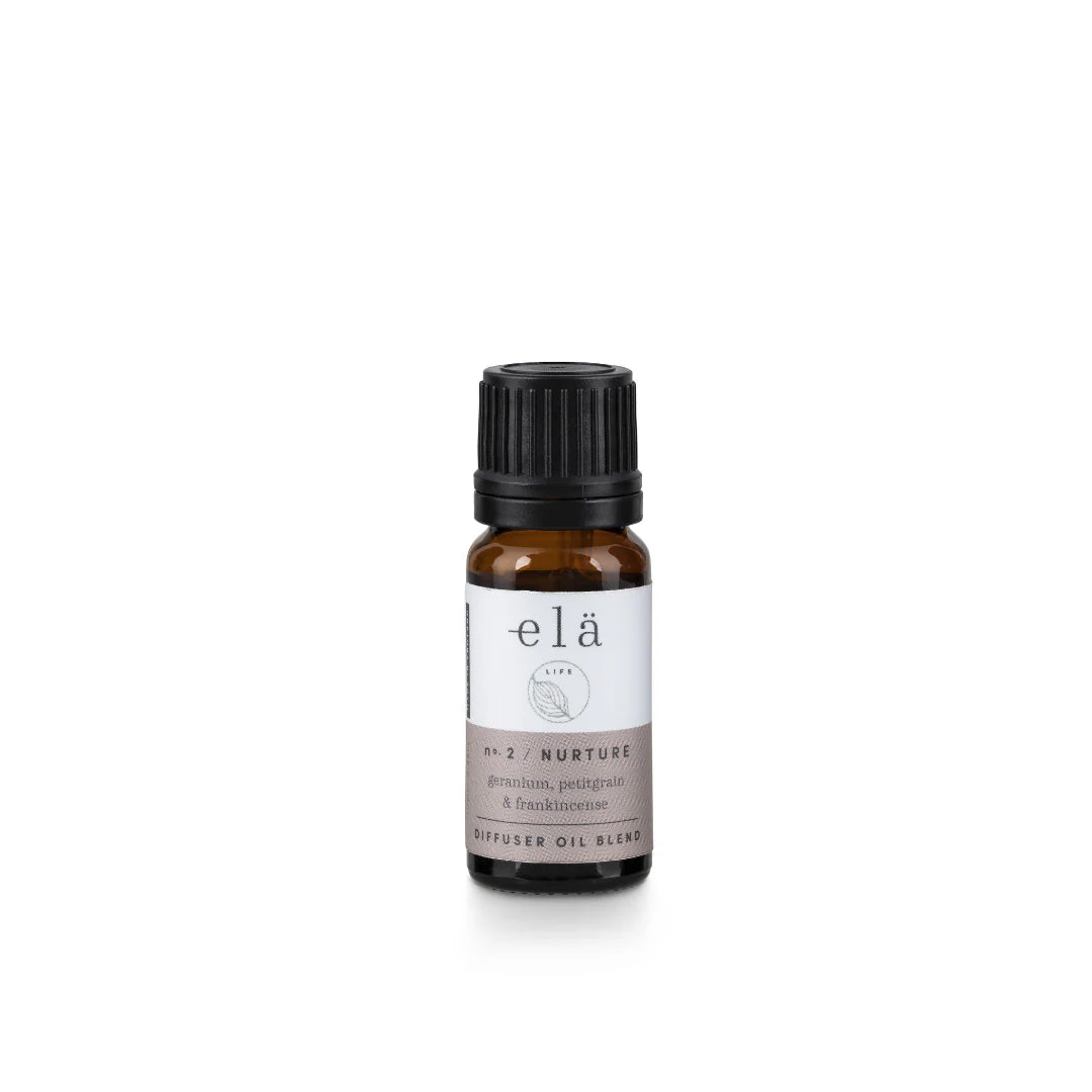 elá Life No. 2 Nurture diffuser oil blend in an amber glass bottle with a black cap.  Geranium, petitgrain & frankincense.