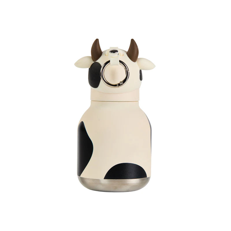 Cow-shaped water bottle on a white background