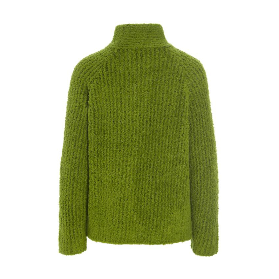 Green knitted sweater on a white background