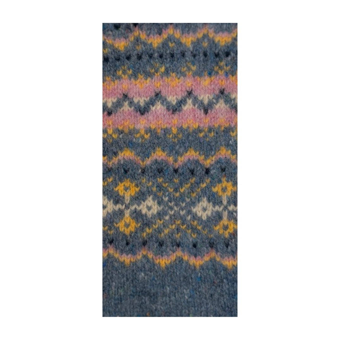 Knitted fabric with a colorful pattern on a white background