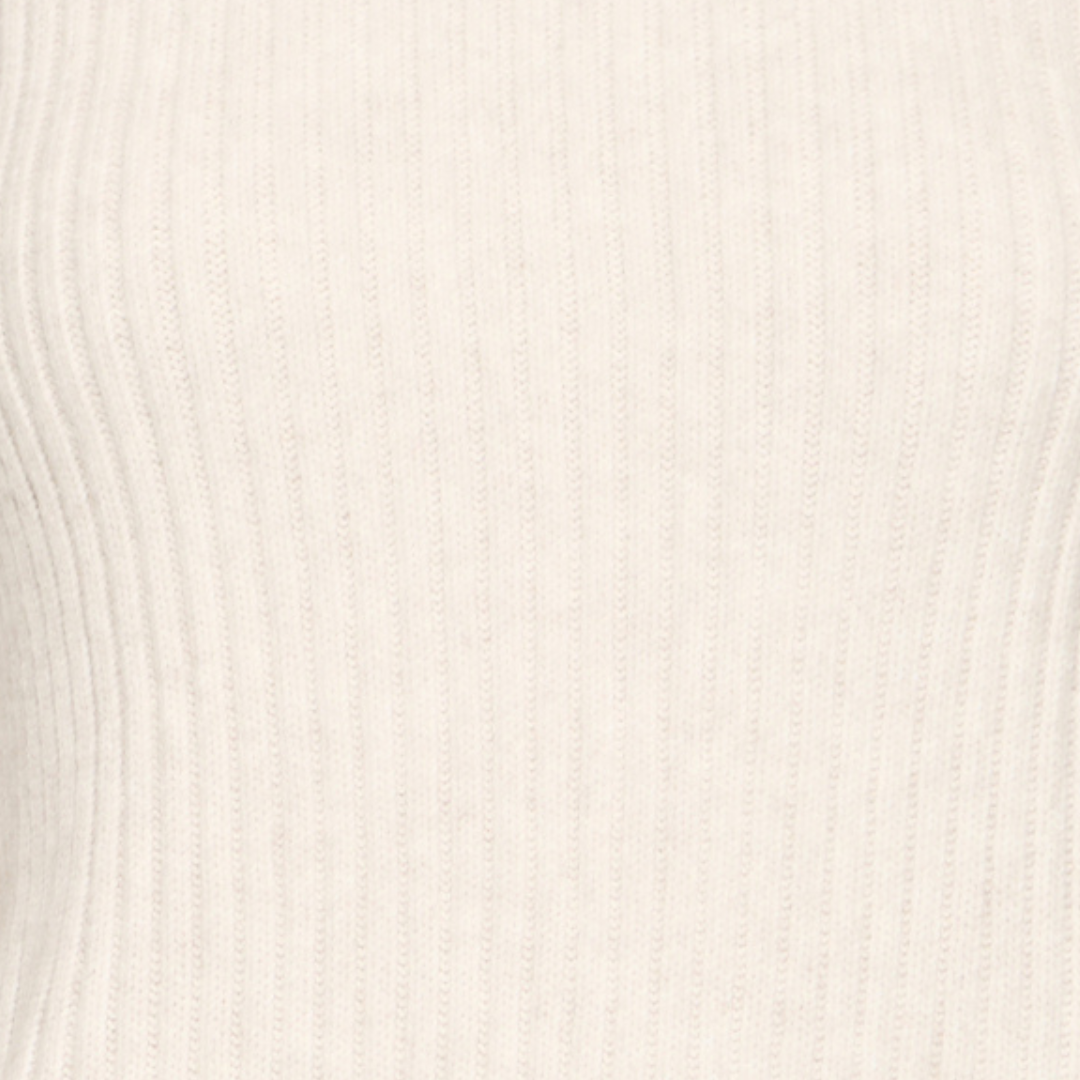 Close-up of a textured white fabric surface