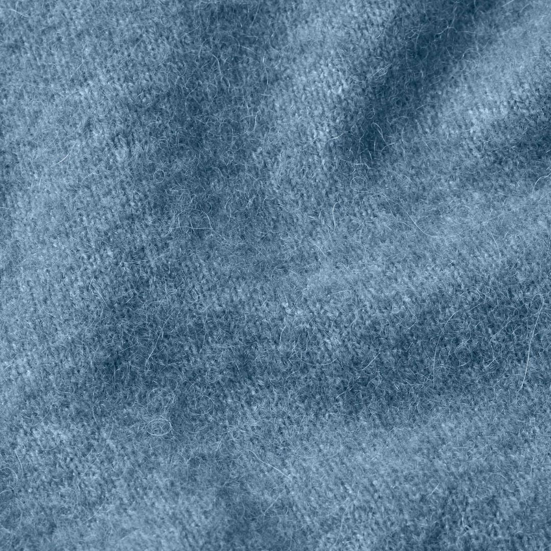 Textured blue surface with a subtle pattern