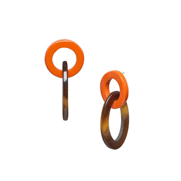 Pair of earrings with orange and tortoiseshell design on a white background