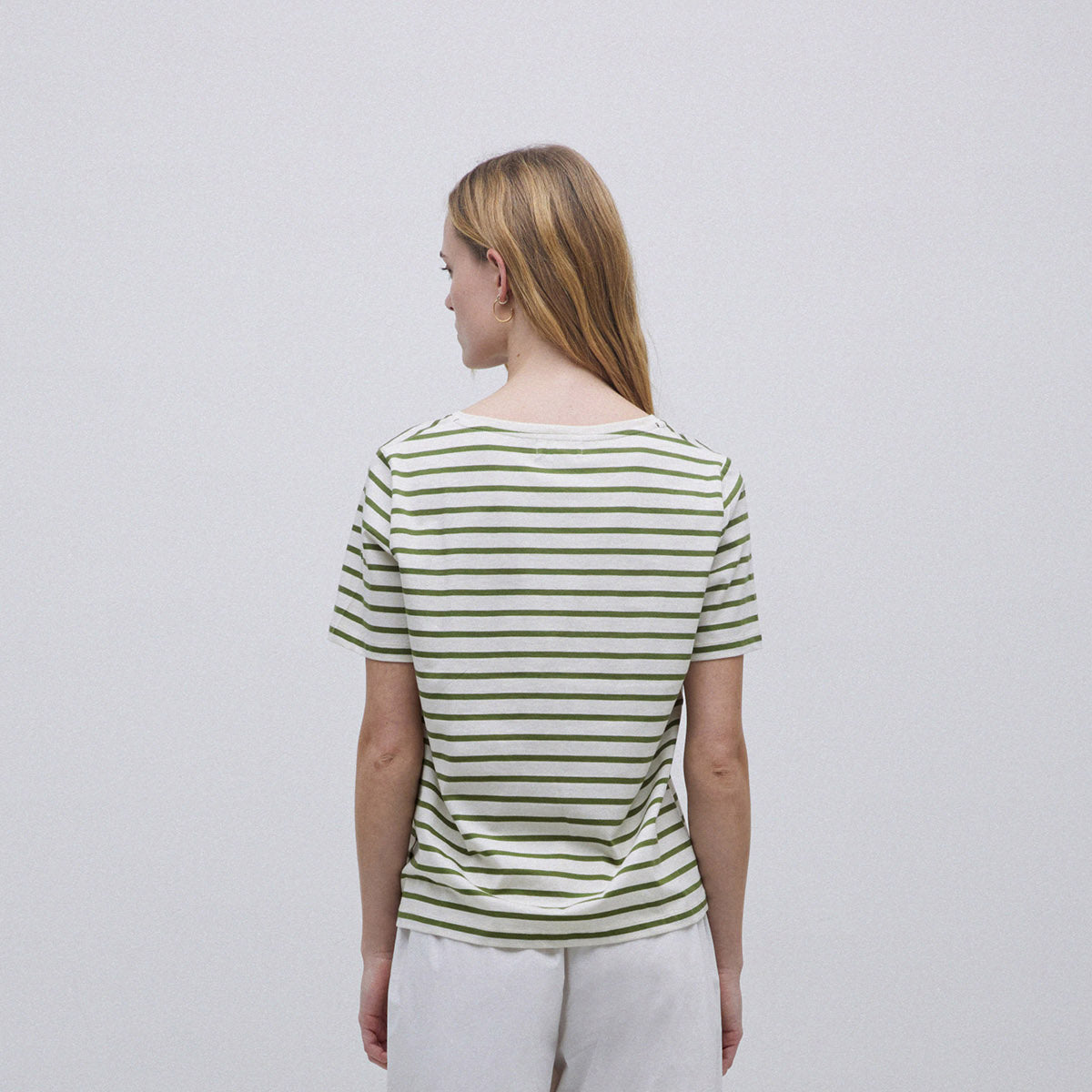 Women's short-sleeve, olive green and white striped Breton top, viewed from the back.
