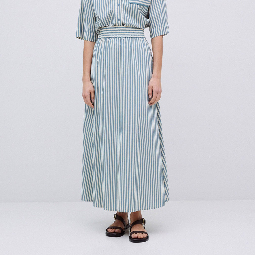 Blue and white striped midi skirt with elastic waistband.