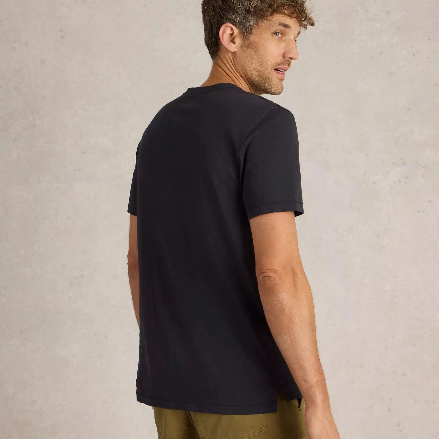 Dark navy crew neck short-sleeve t-shirt, shown from the back.