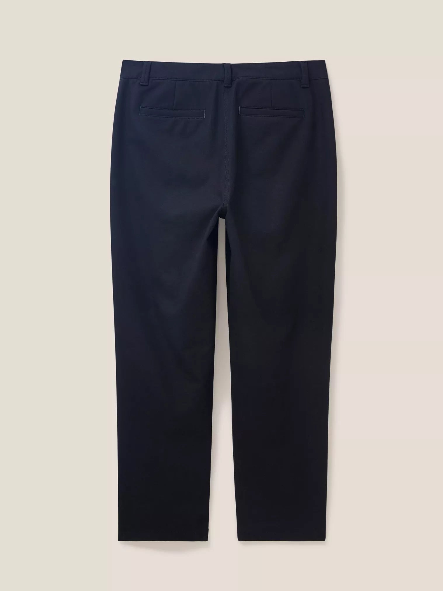 Dark navy cropped trousers, viewed from the back, featuring a waistband and back pockets.