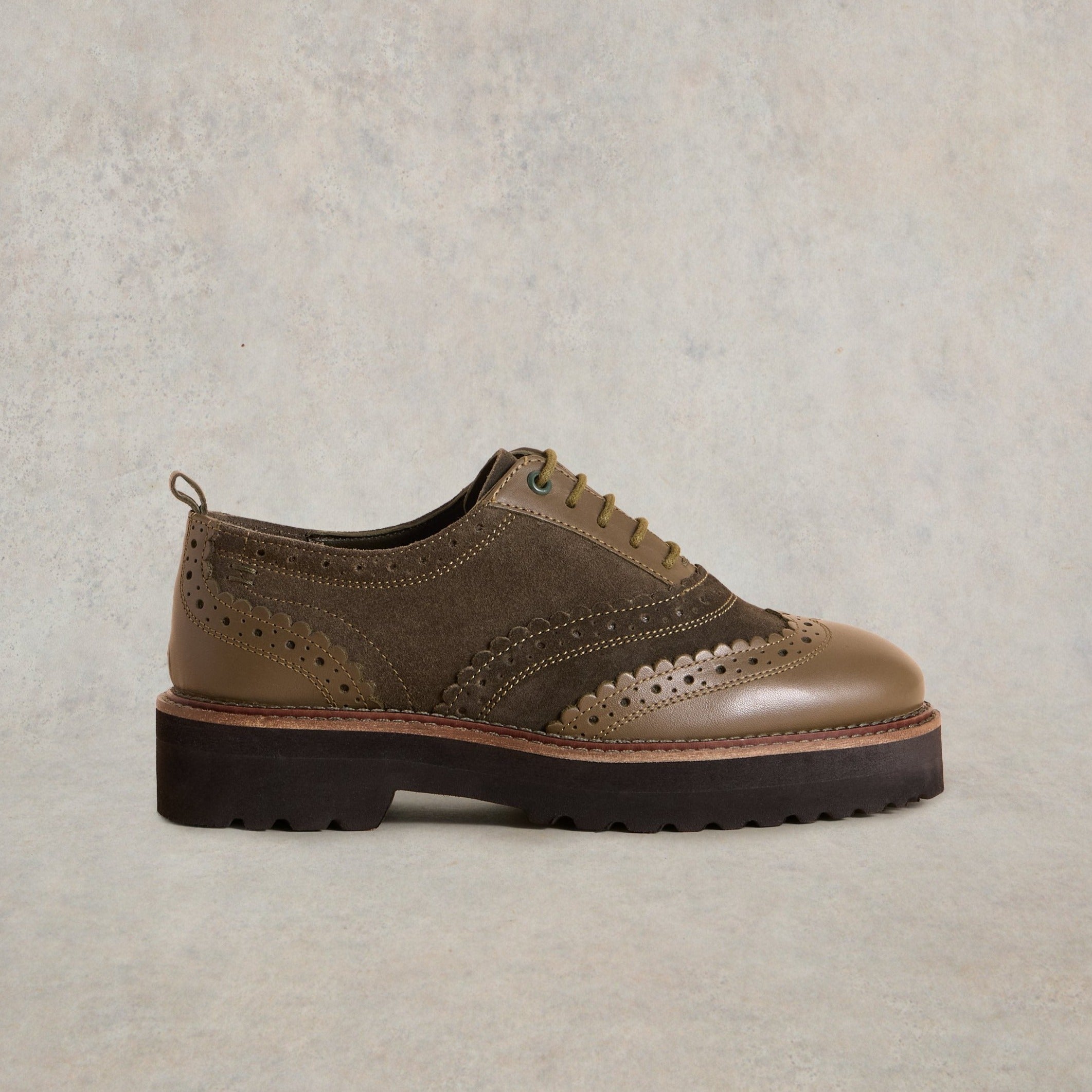 Olive green leather and suede brogue oxford shoes with a chunky platform sole and scalloped detailing.