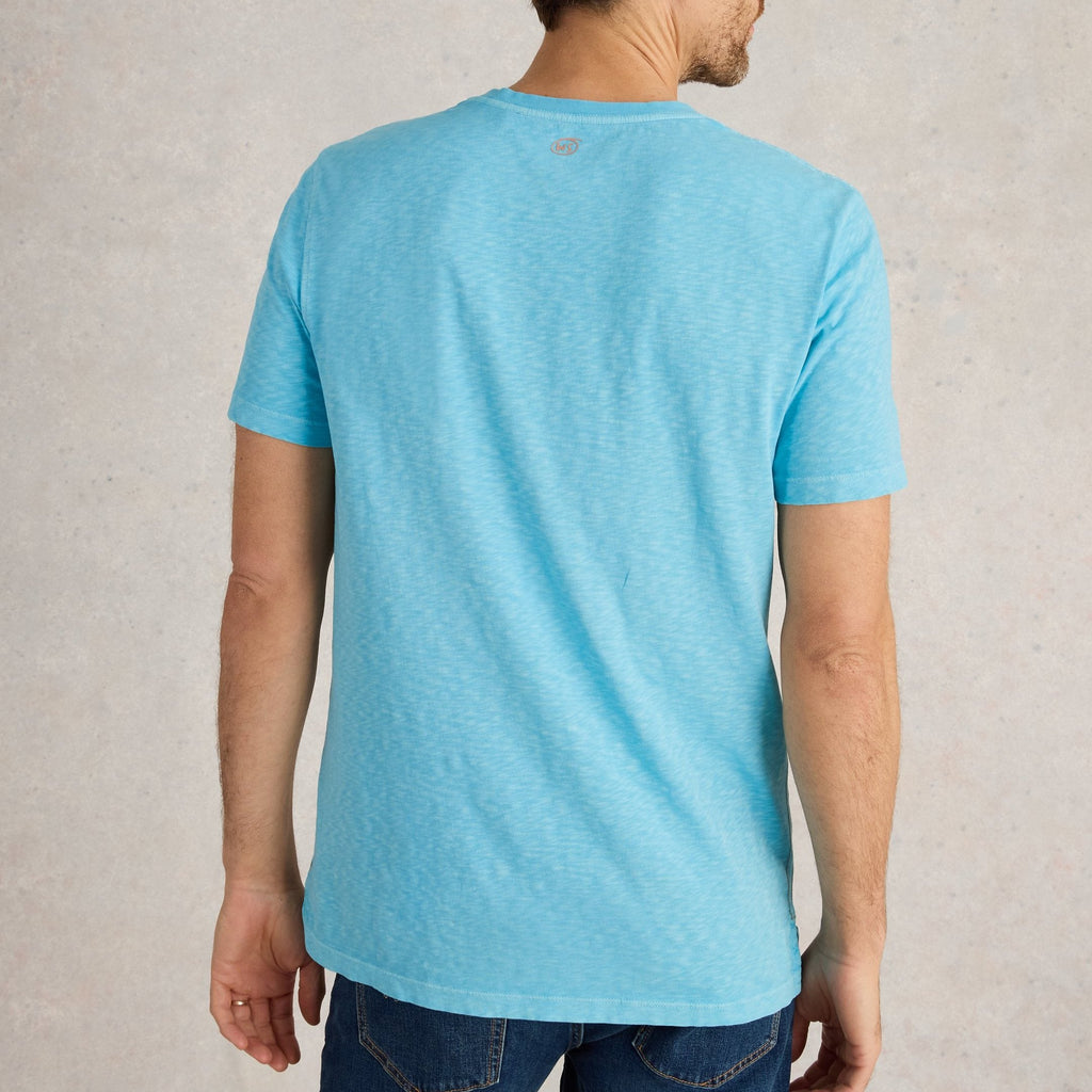 Light blue short-sleeve crew neck t-shirt with subtle heather texture. Small logo on back.