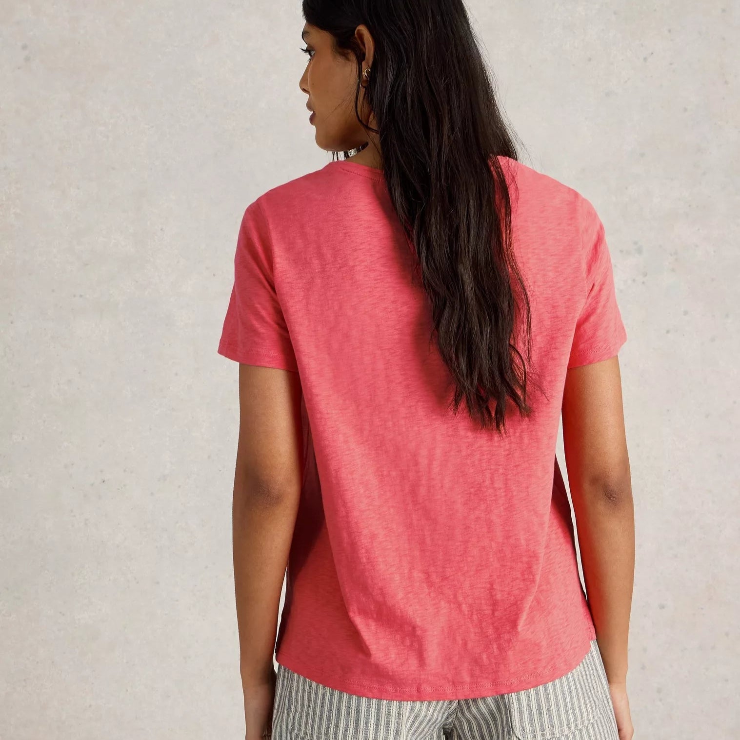 Coral pink short-sleeved relaxed-fit cotton t-shirt.