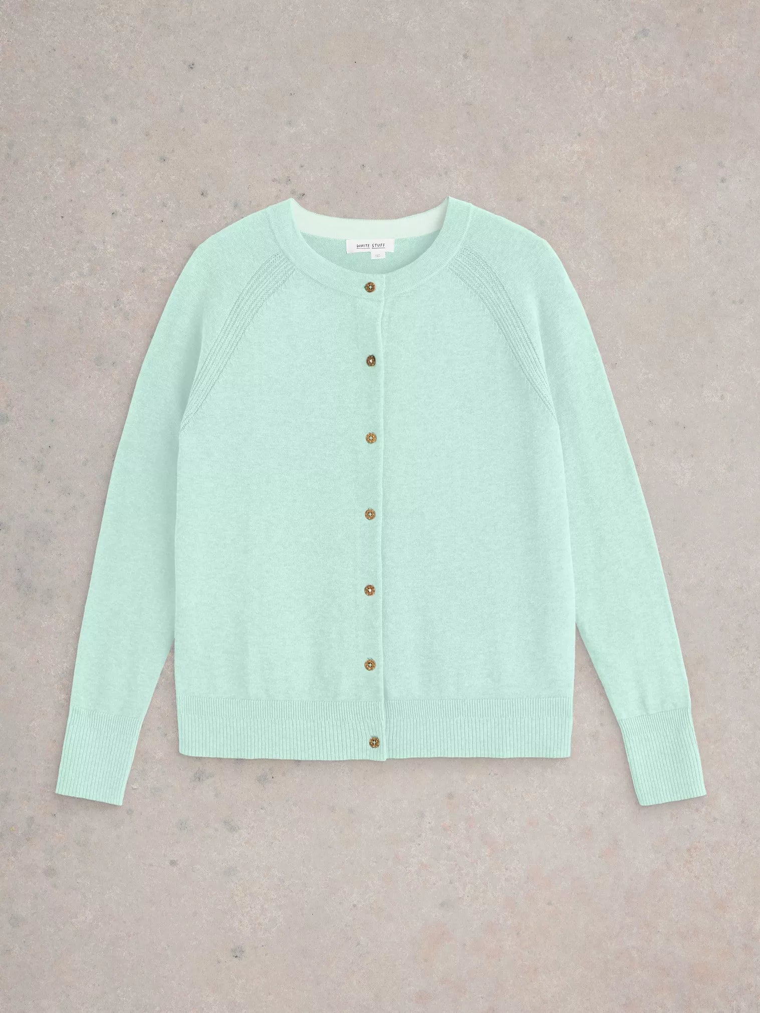 Pale green button-front cardigan sweater with ribbed cuffs and hem.