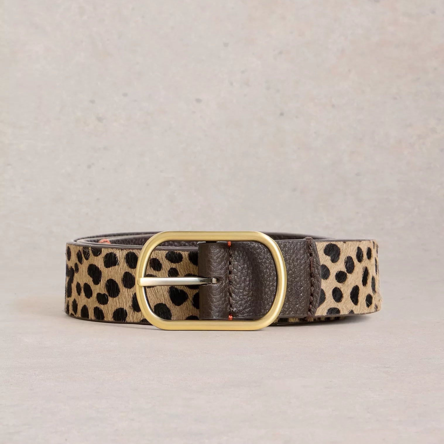 Brown leather belt with a gold buckle and a beige and brown leopard print calf hair section.
