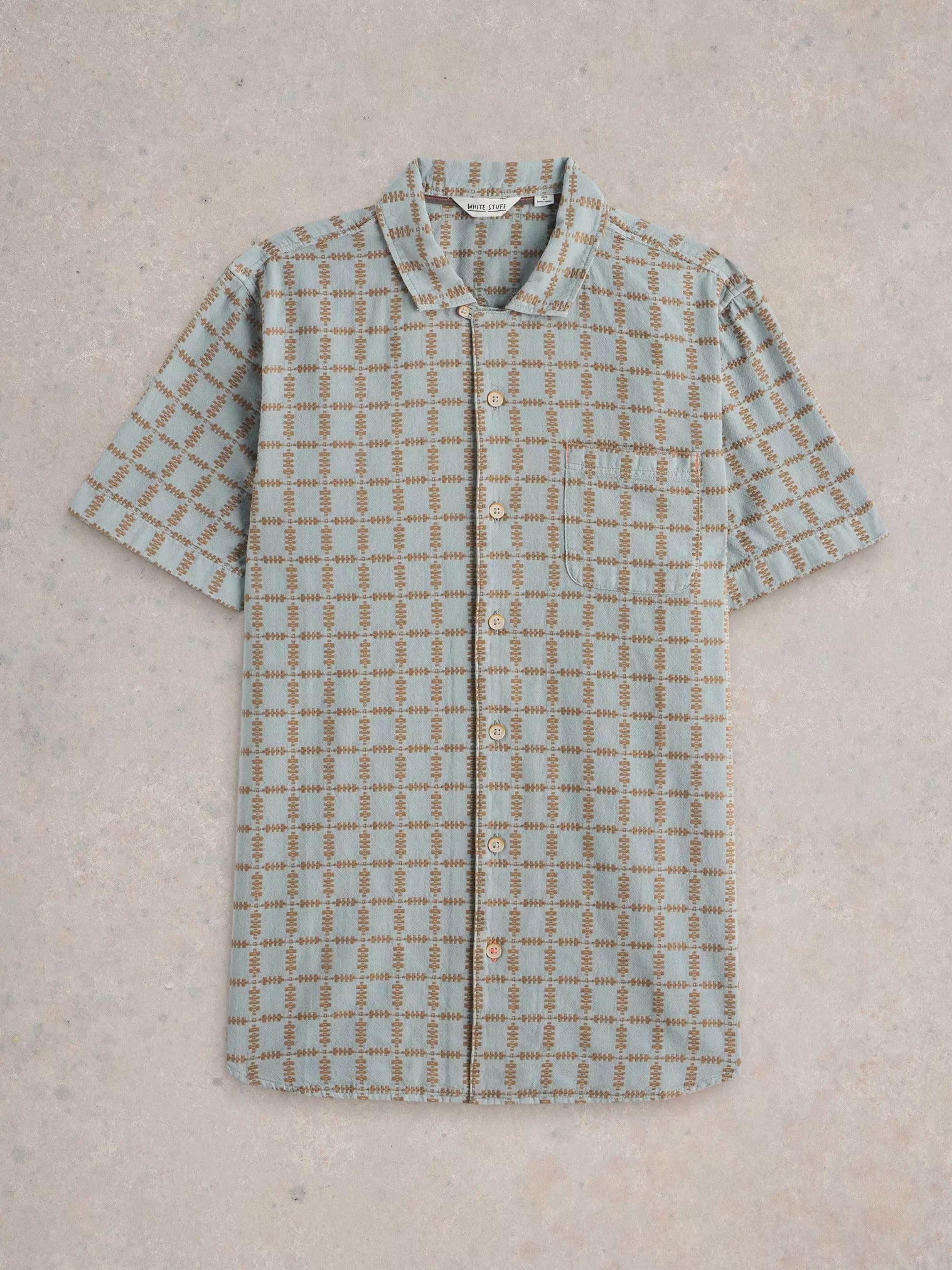 Light blue short-sleeved button-down shirt with a brown geometric grid pattern.