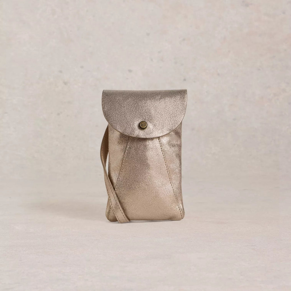 Silver leather pouch with a button on a beige background