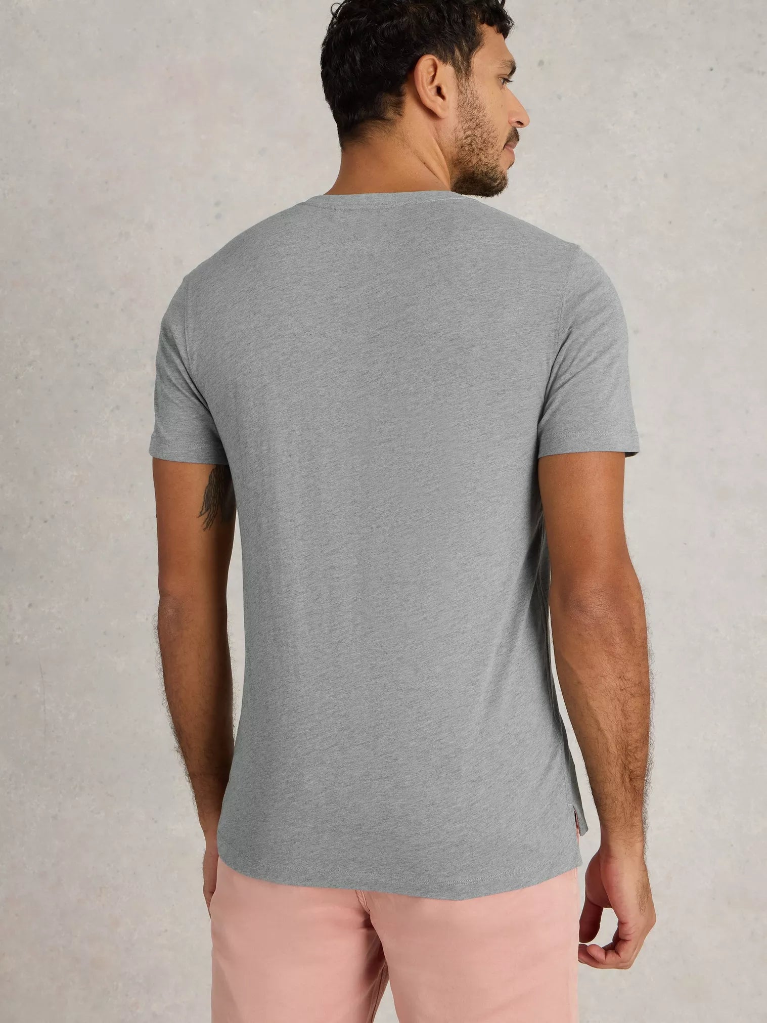 Gray heather short-sleeve crew neck t-shirt with side slits.