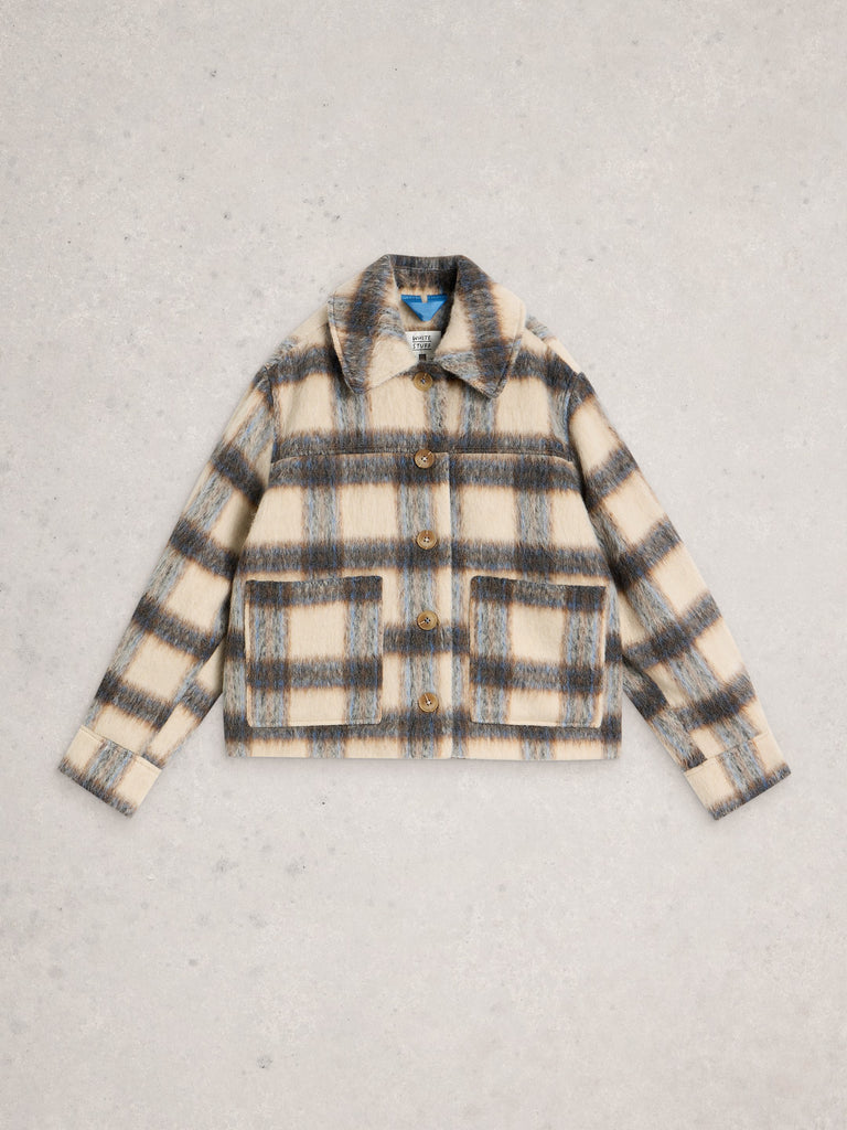 Plaid jacket on a light gray background