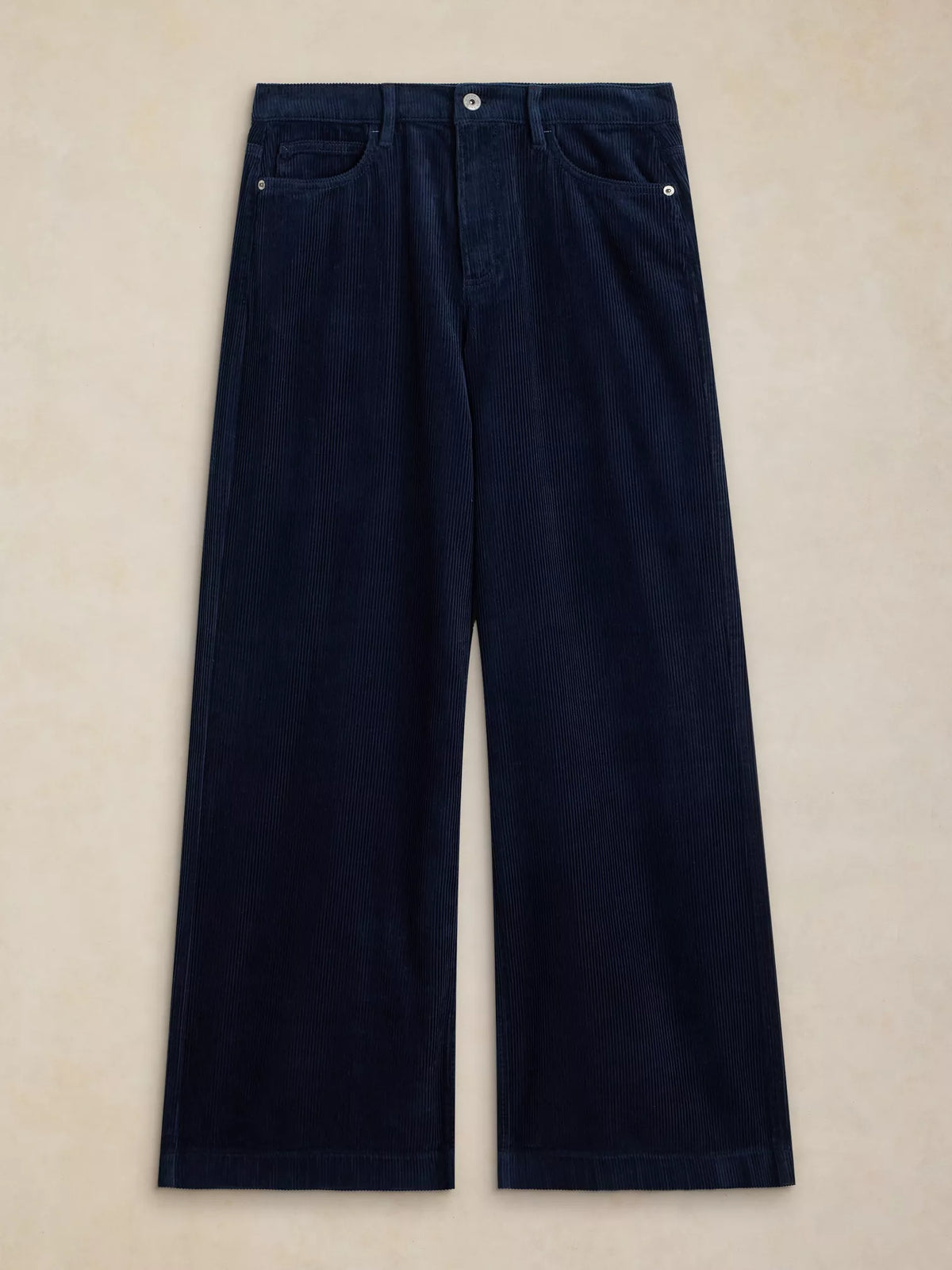 Dark navy blue wide-leg cropped pants with a corduroy texture, laid flat on a light beige background.