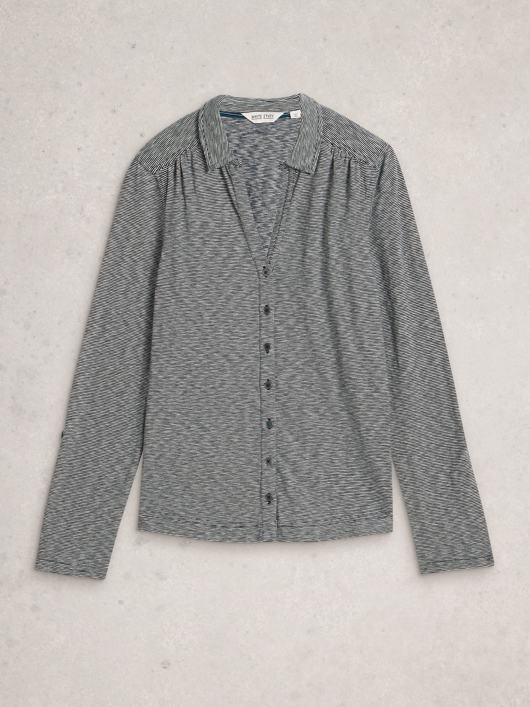 Gray textured shirt on a light gray background