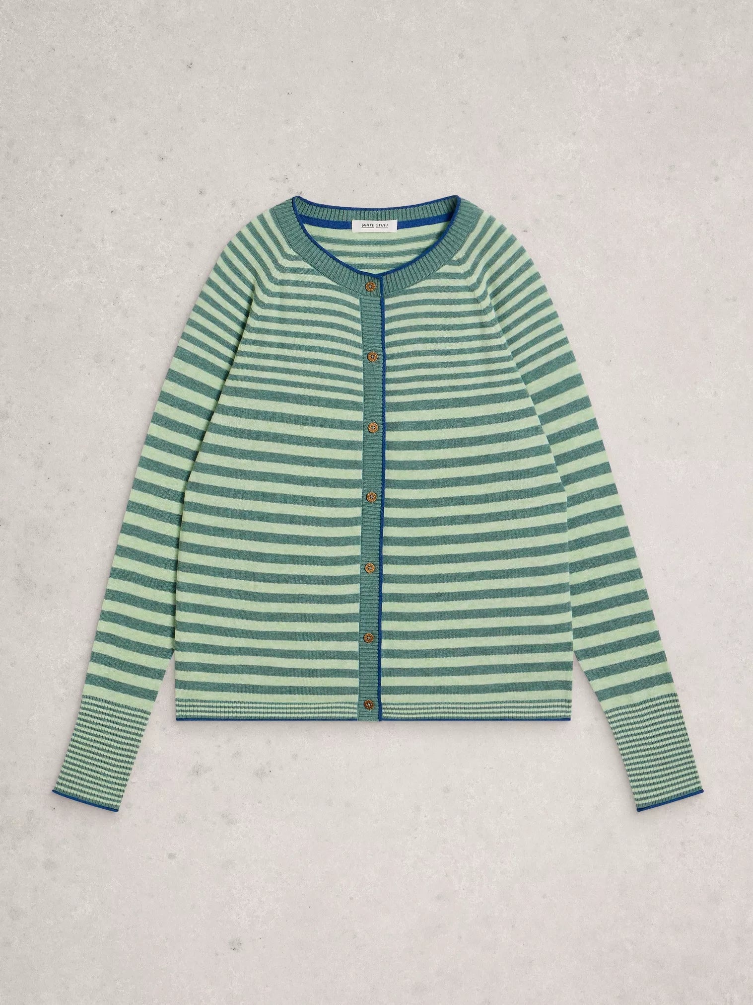 Green and blue striped cardigan on a light gray background