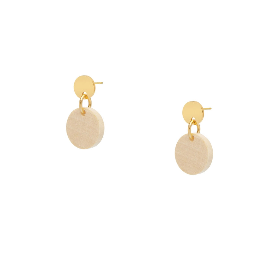Pair of gold and beige earrings on a white background