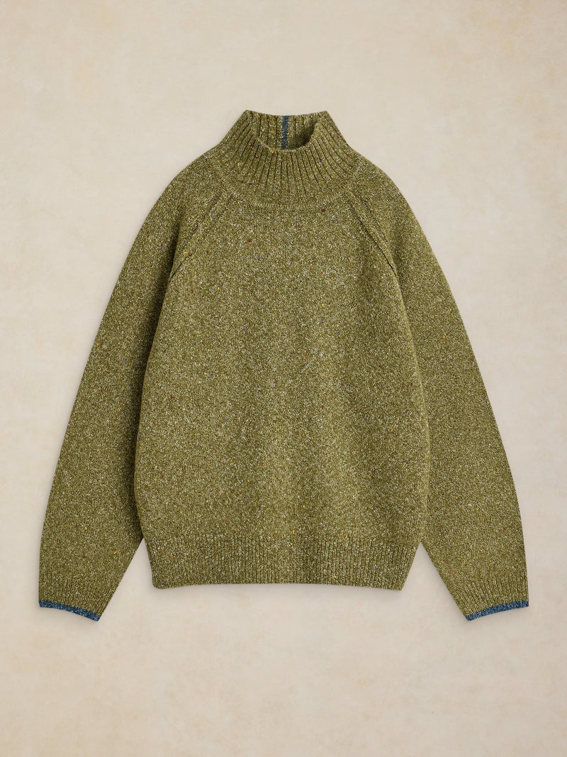 An olive green knit mock neck sweater with a subtle heathered texture, laid flat on a light beige textured background.