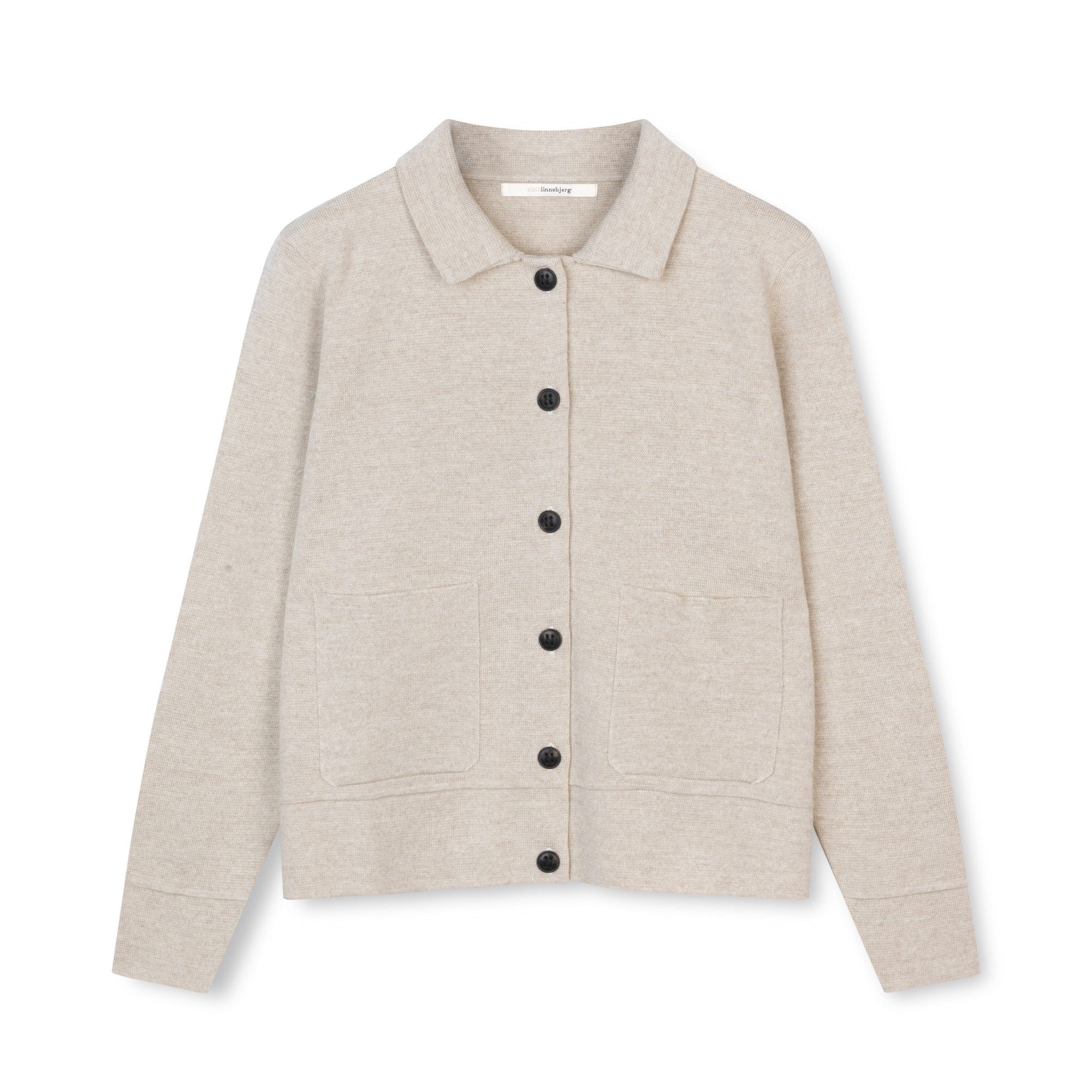 A light beige knit cardigan sweater with a collar, black buttons, and long sleeves, shown flat against a white background.