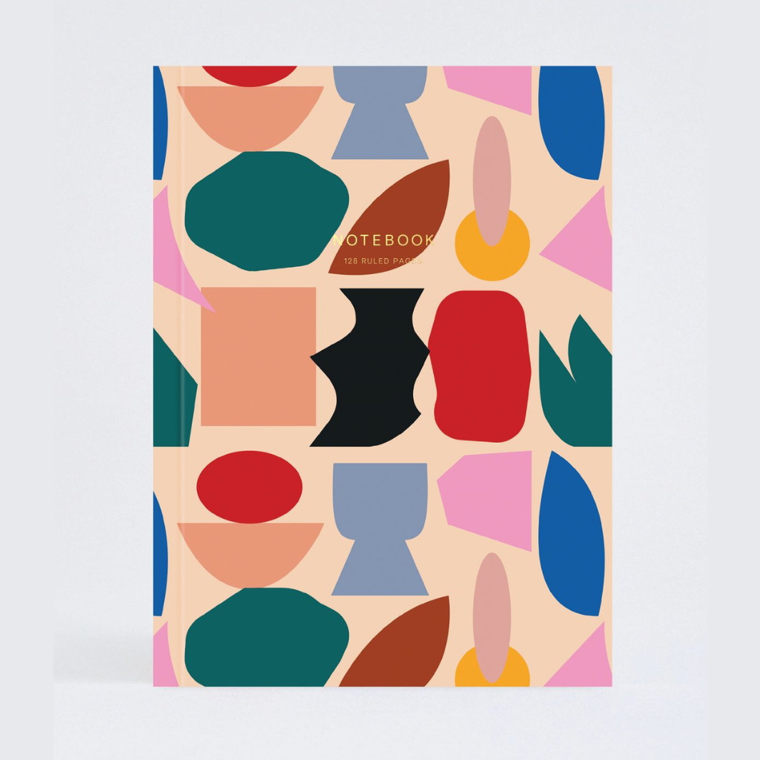 Notebook with 128 ruled pages, featuring a cover design of multicolored abstract shapes on a light beige background.