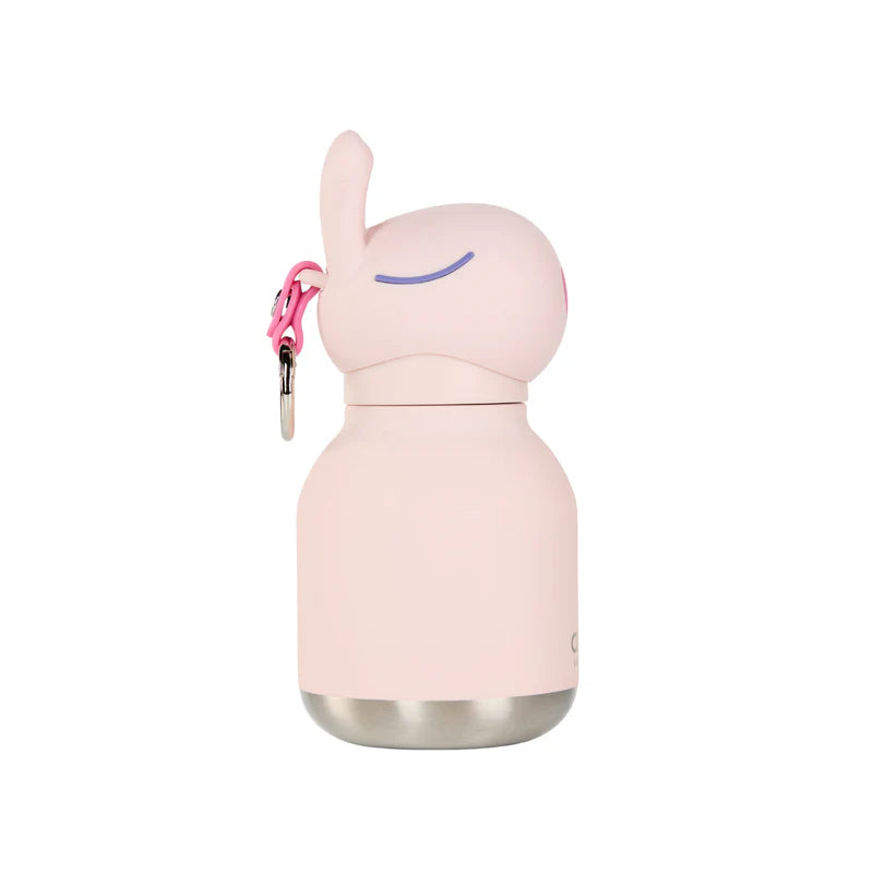 Pink water bottle with a unique design on a white background