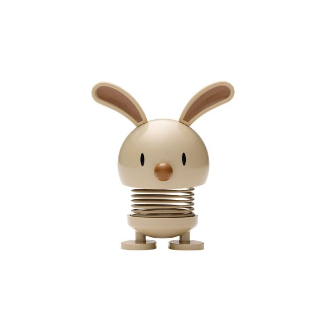 Beige bunny-shaped spring toy with brown ears and nose.