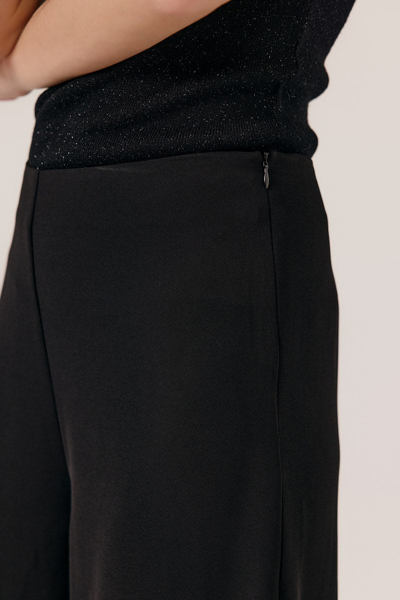 Black pants with a close-up on a neutral background