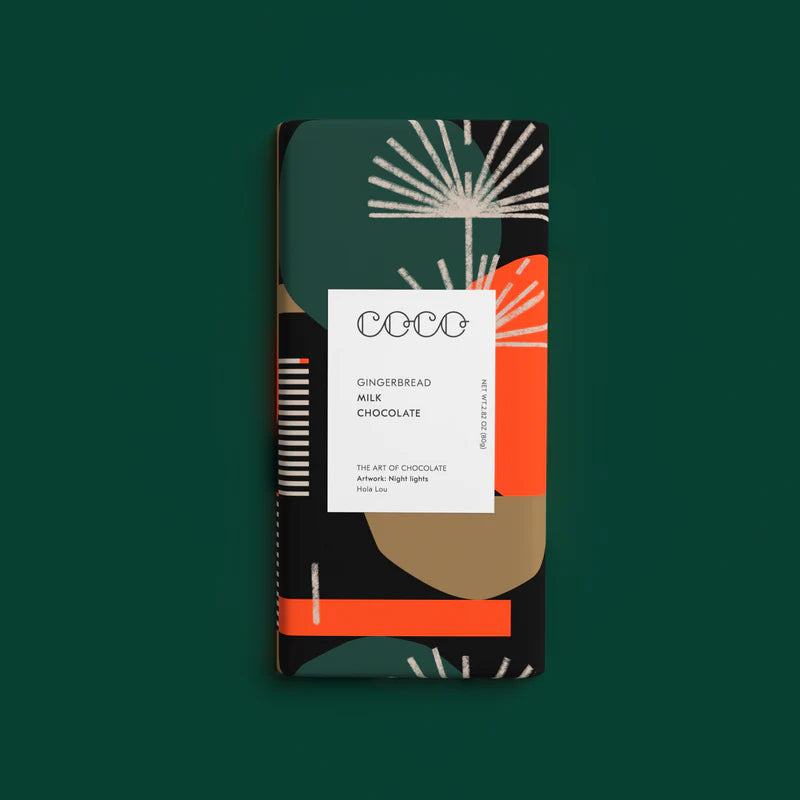 Coco brand gingerbread milk chocolate bar with abstract green, orange, and black packaging.